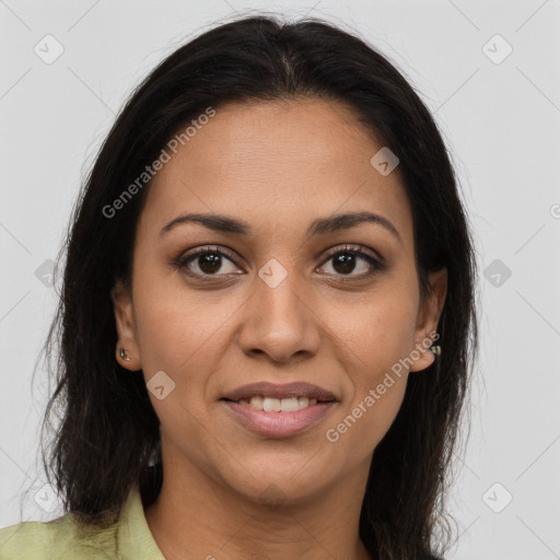 Joyful latino young-adult female with long  brown hair and brown eyes