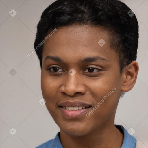 Joyful black young-adult male with short  black hair and brown eyes