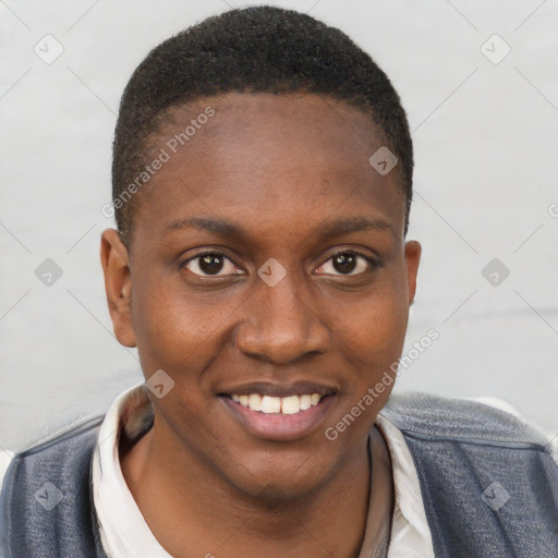 Joyful black young-adult female with short  brown hair and brown eyes