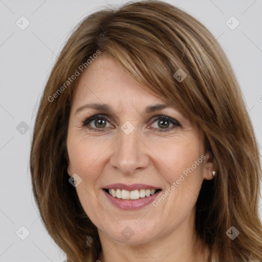 Joyful white adult female with medium  brown hair and brown eyes