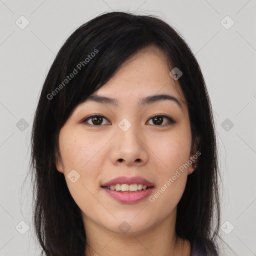 Joyful asian young-adult female with long  brown hair and brown eyes