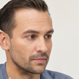 Neutral white young-adult male with short  brown hair and brown eyes