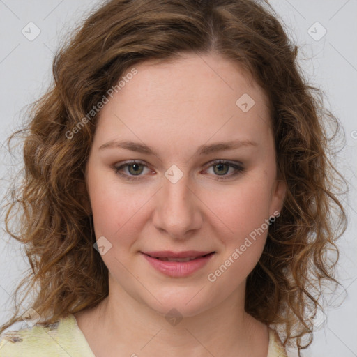 Joyful white young-adult female with medium  brown hair and green eyes