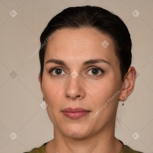 Neutral white young-adult female with short  brown hair and brown eyes