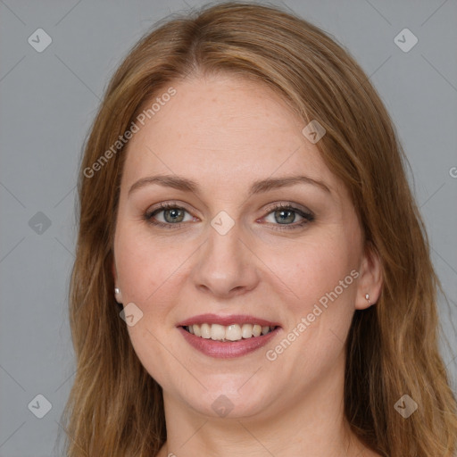 Joyful white young-adult female with long  brown hair and blue eyes