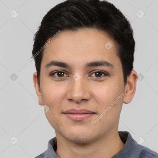 Joyful white young-adult male with short  black hair and brown eyes