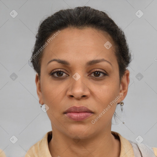 Joyful latino adult female with short  brown hair and brown eyes