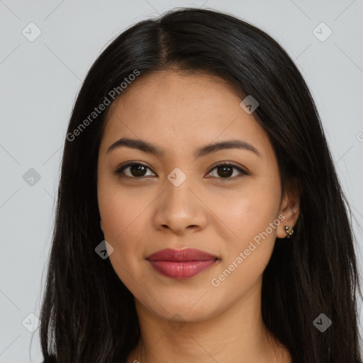 Joyful latino young-adult female with long  brown hair and brown eyes