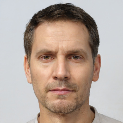 Neutral white adult male with short  brown hair and brown eyes