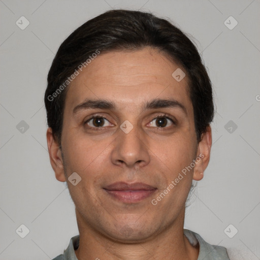 Joyful white adult male with short  brown hair and brown eyes