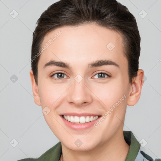 Joyful white young-adult female with short  brown hair and brown eyes