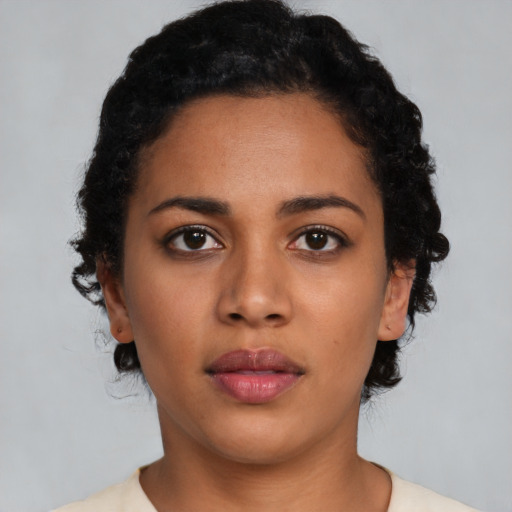 Neutral latino young-adult female with short  black hair and brown eyes
