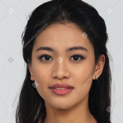 Joyful asian young-adult female with long  black hair and brown eyes