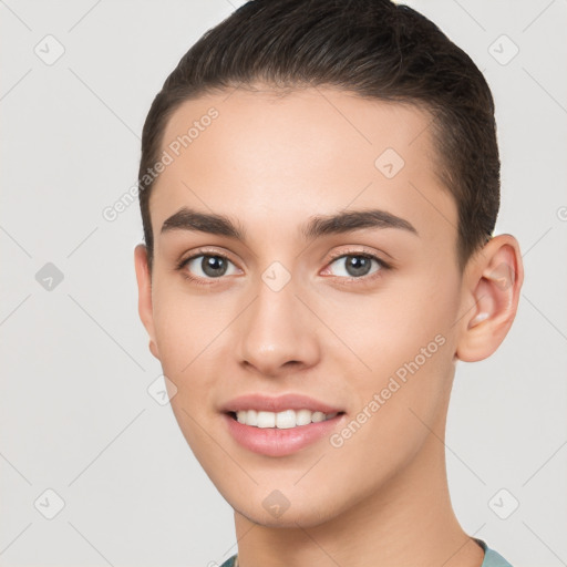 Joyful white young-adult female with short  brown hair and brown eyes