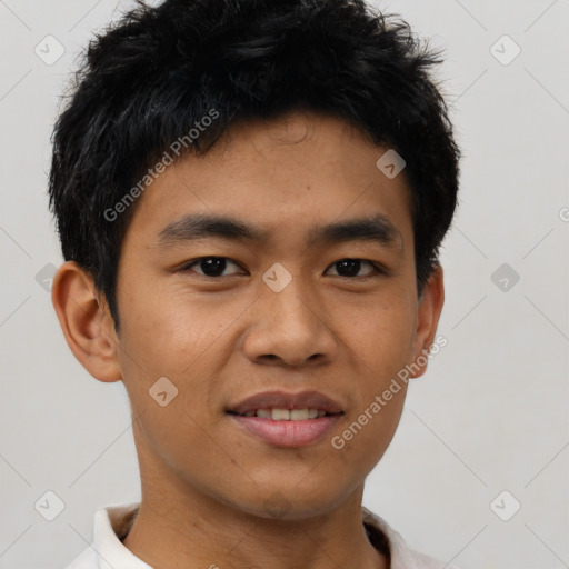 Joyful asian young-adult male with short  black hair and brown eyes