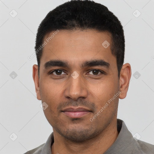 Neutral latino young-adult male with short  black hair and brown eyes