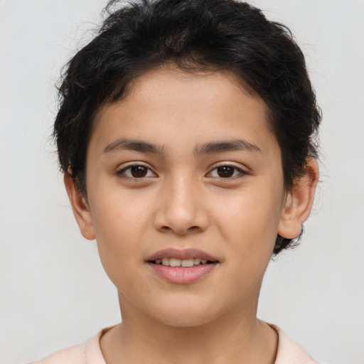 Joyful latino child female with short  brown hair and brown eyes