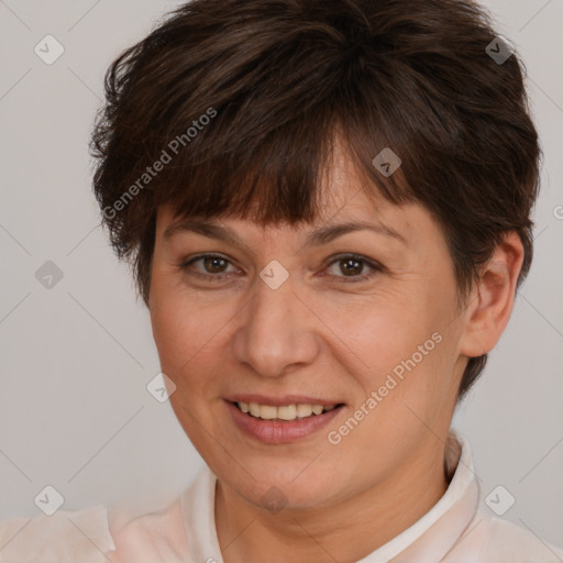 Joyful white adult female with short  brown hair and brown eyes