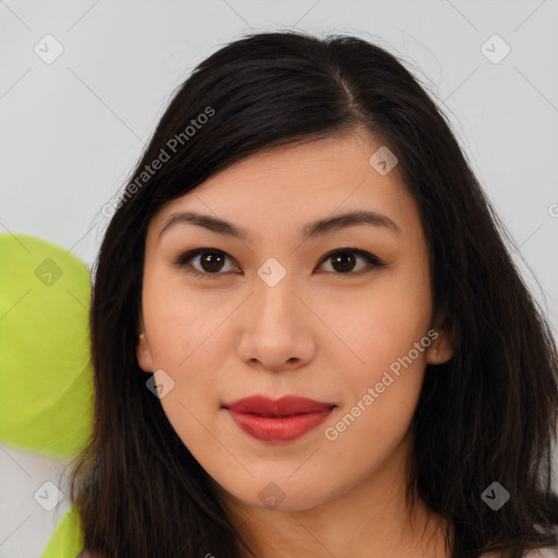 Joyful asian young-adult female with long  brown hair and brown eyes