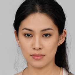 Neutral asian young-adult female with medium  brown hair and brown eyes