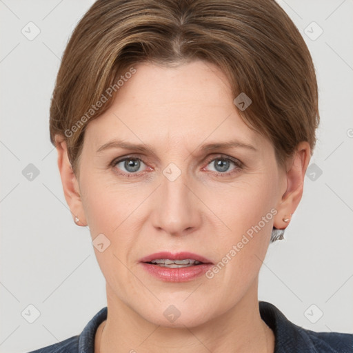 Joyful white young-adult female with short  brown hair and grey eyes