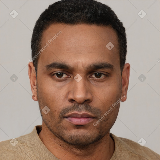 Neutral latino young-adult male with short  black hair and brown eyes