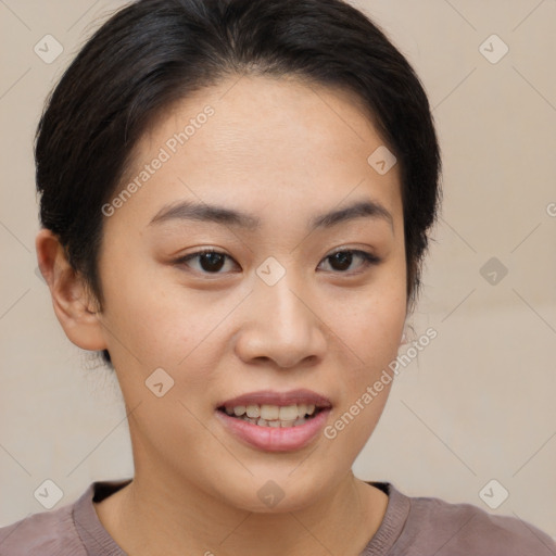 Joyful asian young-adult female with short  brown hair and brown eyes