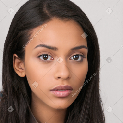 Neutral latino young-adult female with long  brown hair and brown eyes