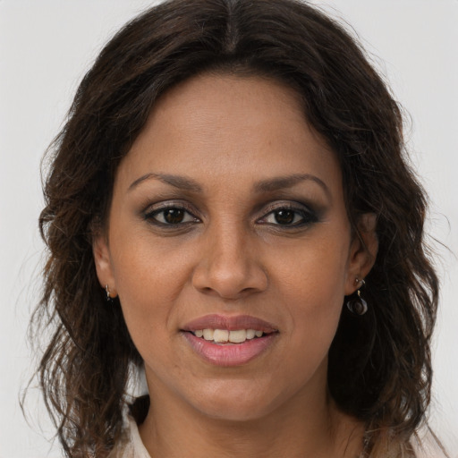 Joyful white young-adult female with long  brown hair and brown eyes