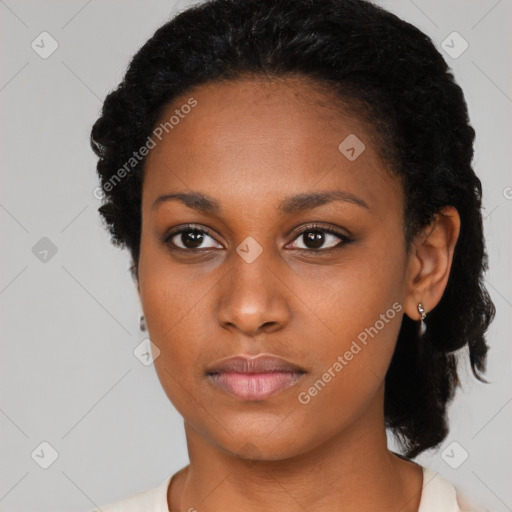 Neutral black young-adult female with short  black hair and brown eyes