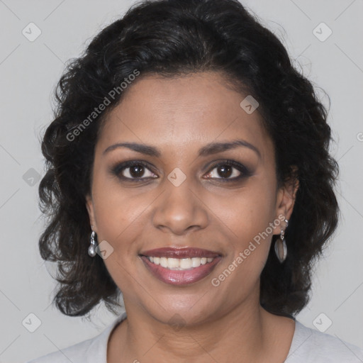 Joyful black young-adult female with medium  brown hair and brown eyes