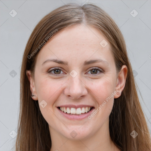 Joyful white young-adult female with long  brown hair and grey eyes