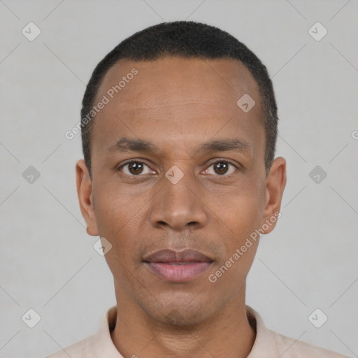 Neutral black young-adult male with short  black hair and brown eyes