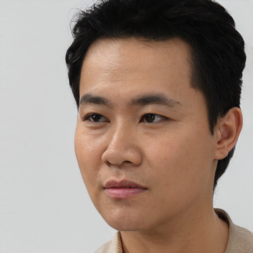 Neutral asian young-adult male with short  black hair and brown eyes