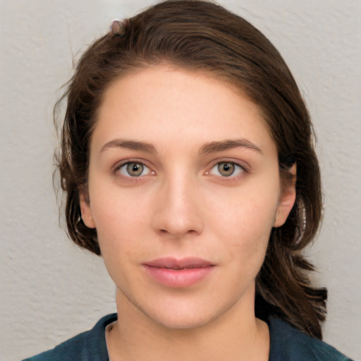 Neutral white young-adult female with medium  brown hair and grey eyes