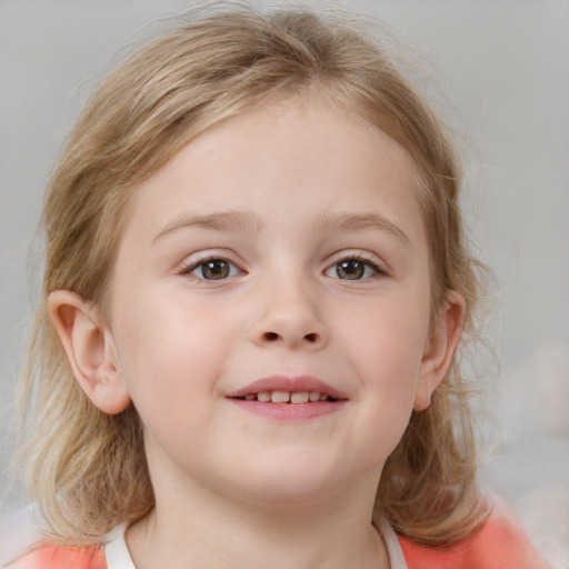 Joyful white child female with medium  brown hair and blue eyes