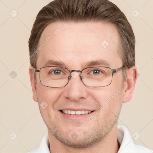 Joyful white adult male with short  brown hair and grey eyes