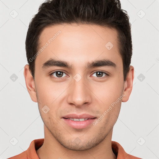 Joyful white young-adult male with short  brown hair and brown eyes