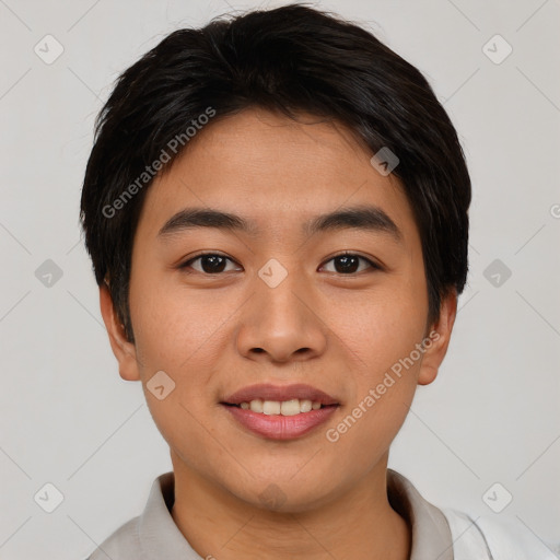 Joyful asian young-adult male with short  brown hair and brown eyes