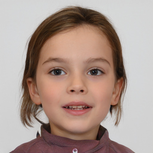 Joyful white child female with medium  brown hair and brown eyes