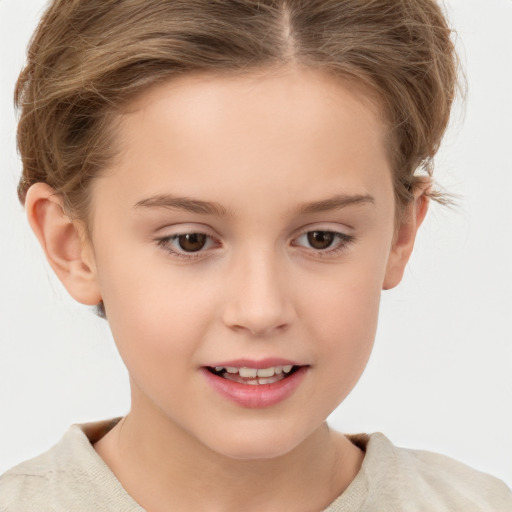 Joyful white child female with short  brown hair and grey eyes