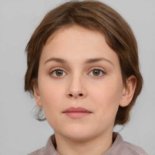 Neutral white young-adult female with medium  brown hair and grey eyes