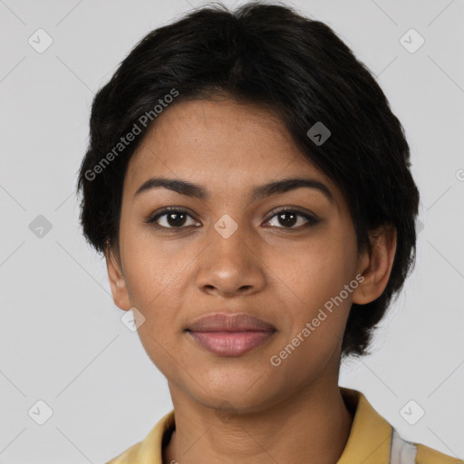 Joyful latino young-adult female with short  black hair and brown eyes