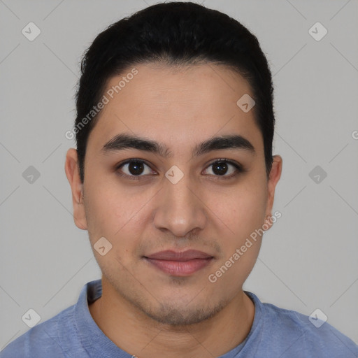 Joyful latino young-adult male with short  black hair and brown eyes