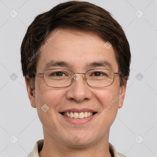 Joyful white adult male with short  brown hair and grey eyes