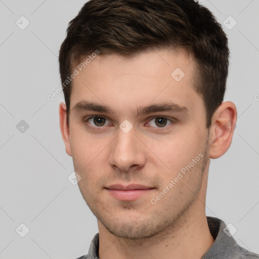 Neutral white young-adult male with short  brown hair and brown eyes