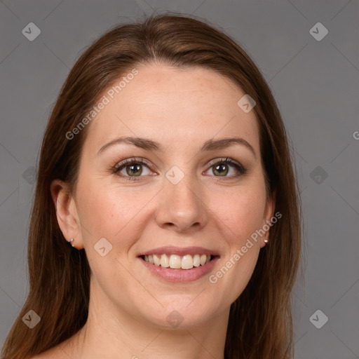 Joyful white young-adult female with long  brown hair and grey eyes