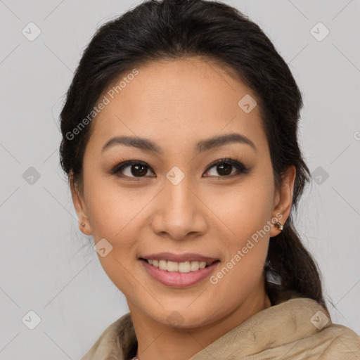 Joyful latino young-adult female with medium  brown hair and brown eyes