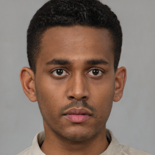 Neutral latino young-adult male with short  brown hair and brown eyes