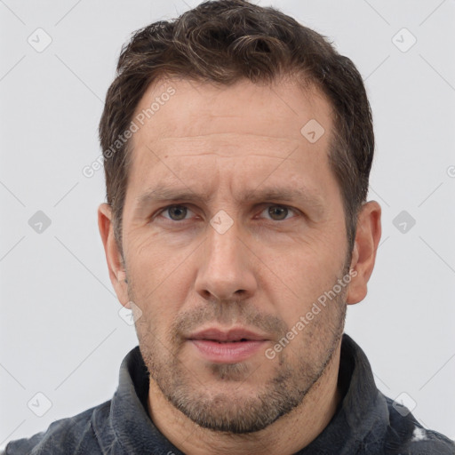 Neutral white adult male with short  brown hair and brown eyes